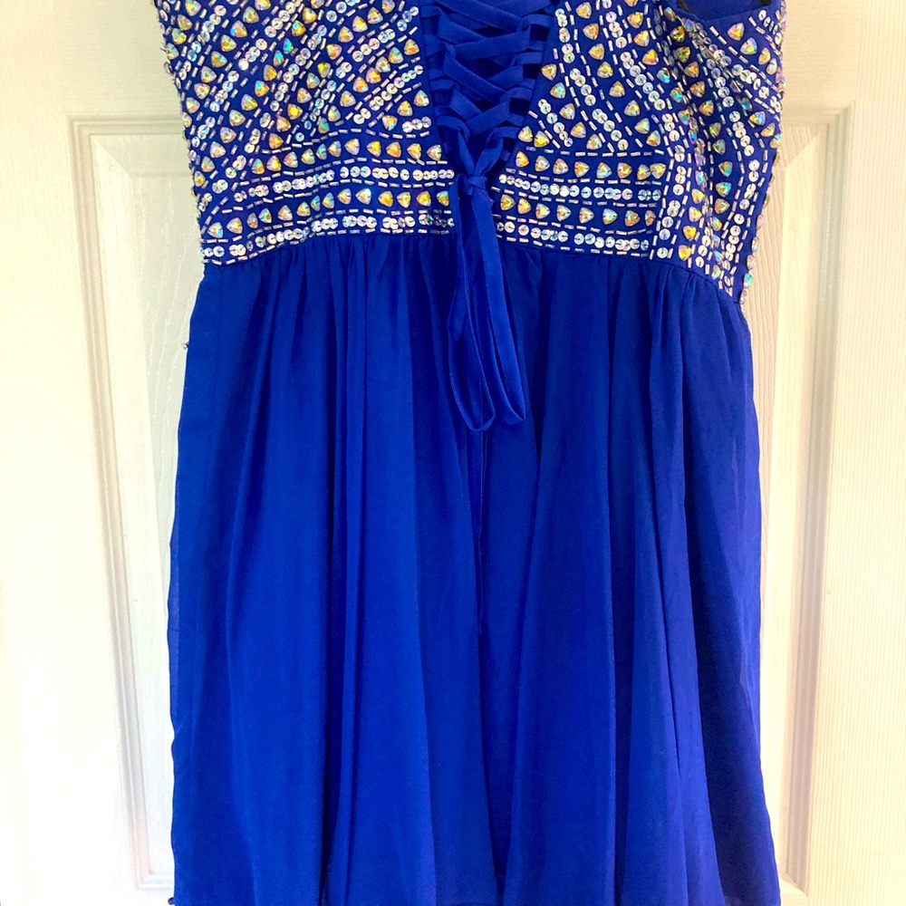 Electric Blue fits size 10-14